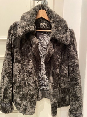 Faux fur gray small like new with design on sleeve and shoulders