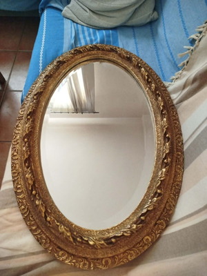 Antique oval mirror used with gold wooden frame