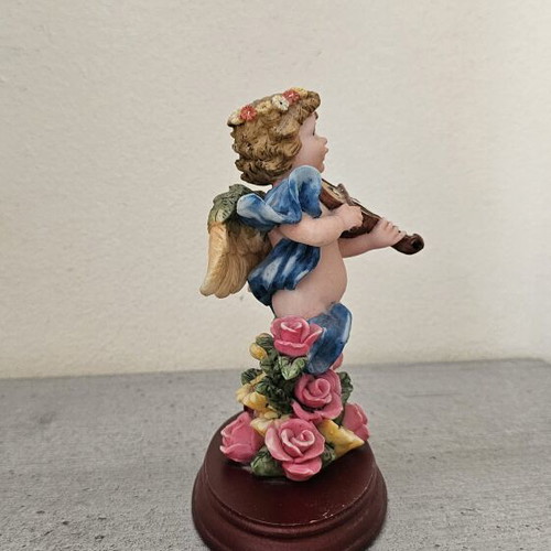 Decorative angel figurine with violin like new
