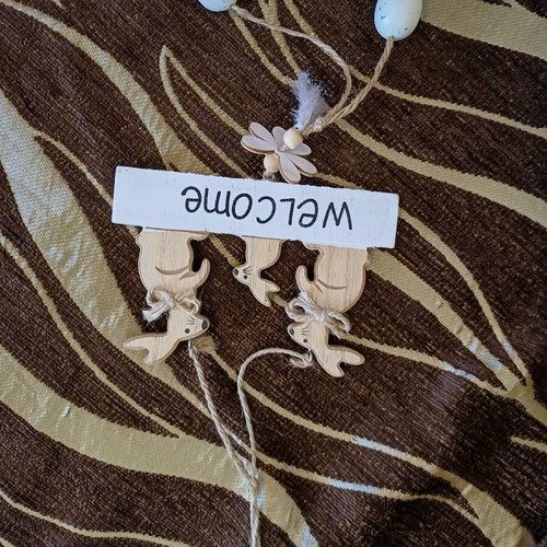 Hanging wooden decorative Easter sign rabbits like new