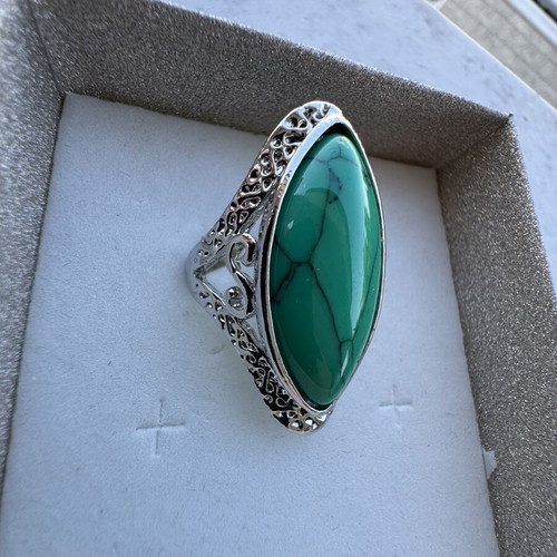 Ring size 9 new, green and silver