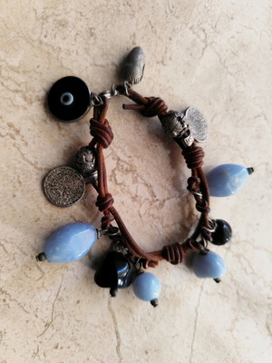 Bracelet with leather, silver elements and blue/black beads like new