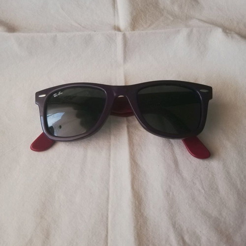 Ray Ban sunglasses used with purple frame and black-blue lenses