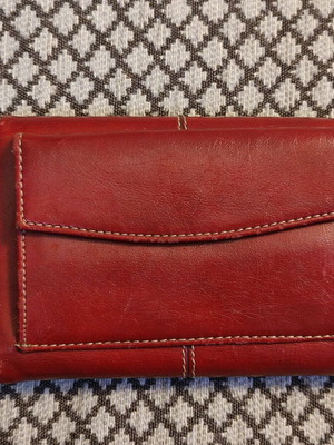 Red wallet used with multiple compartments