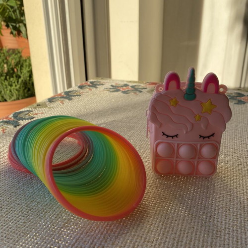 Girls' set with silicone wallet and slinky toy like new