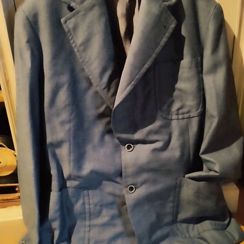 Tailored spring jacket used, hand-stitched