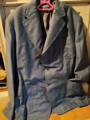 Tailored spring jacket used, hand-stitched
