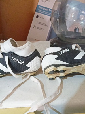 Adidas Predator football shoes size 31 and Umbro cleats size 28.5