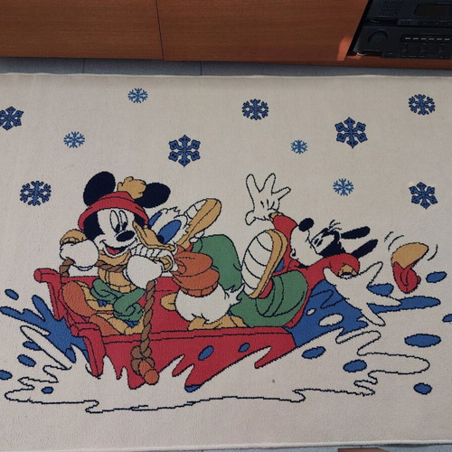 Beige carpet with Disney heroes from Biokarpet