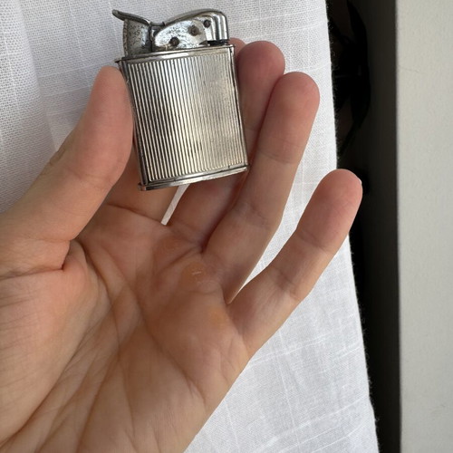 Evans Vintage lighter used with wear