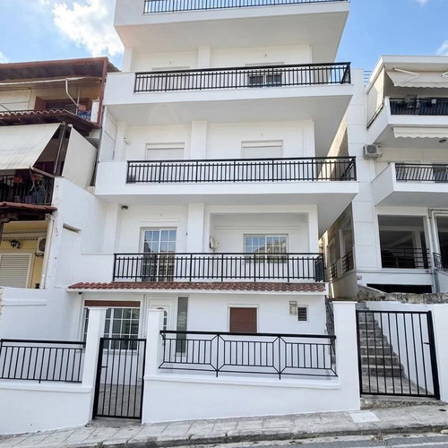 Building in Thessaloniki Sykies with parking, balcony, and city view