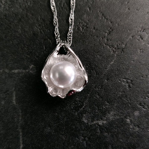 Necklace with white pearl and lotus leaf design, like new