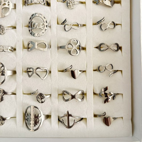 Box of 36 new steel rings with adjustable and fixed sizes