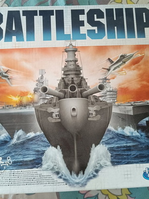 Battleship board game like new, missing one background cardboard