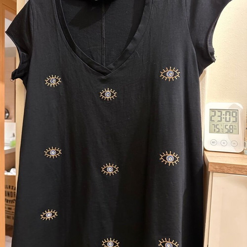Blouse with eye motifs like new, black