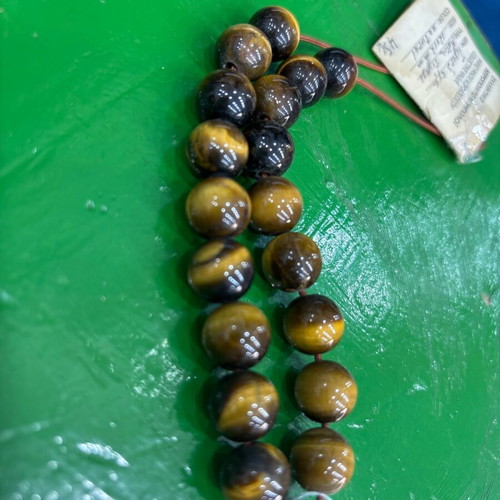 Worry beads new with tiger's eye stone and certificate of authenticity