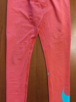 Nike leggings size Medium used, pink with turquoise logo