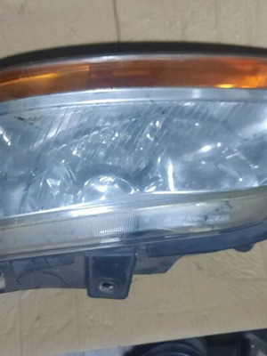 Left headlight for Fiat Idea and Multipla used, original