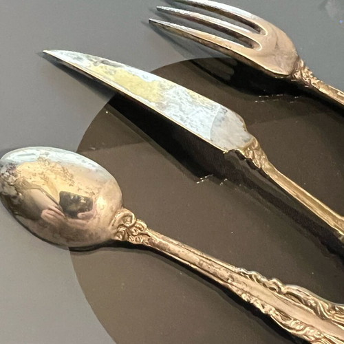 Antique silver-plated cutlery set used, knife fork and spoon in velvet box