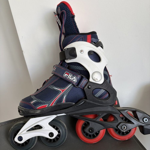 Fila roller skates refurbished with laces, velcro, and ankle buckle