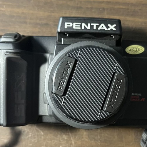 Pentax SFXn 35mm Analog Camera with SMC Pentax-F Zoom Lens like new