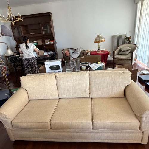 Living room set with beige three-seater and two-seater sofa, 2 stools