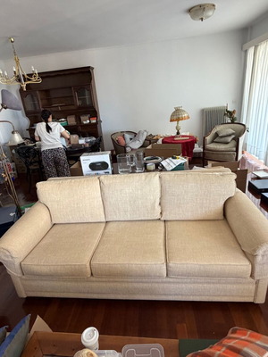 Living room set with beige three-seater and two-seater sofa, 2 stools