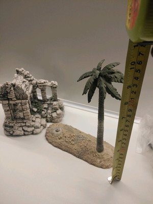Decorative aquarium rocks used with ancient ruins and palm tree design