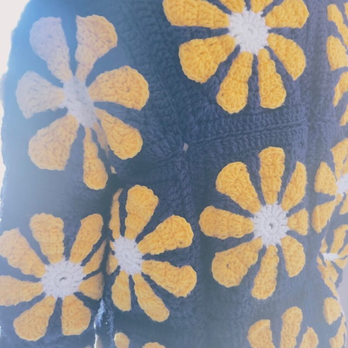 Handmade crochet cardigan made to order with daisies in blue and yellow