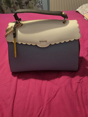 Cromia leather shoulder bag like new, multicolor with chain