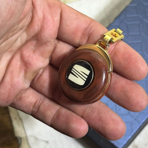 Vintage SEAT keychain used, bakelite with metal details
