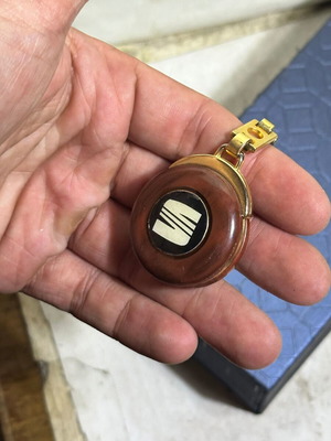 Vintage SEAT keychain used, bakelite with metal details