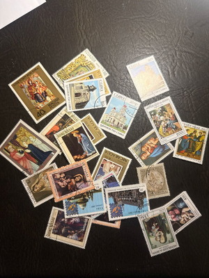 Vintage stamps collection with religious themes and artwork
