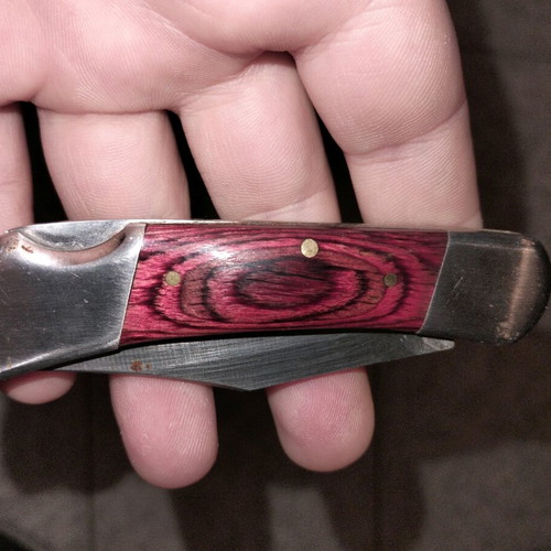 Vintage folding knife with extra safety button, like new