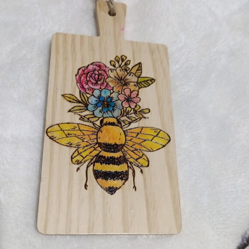 Pyrography on small cutting board like new