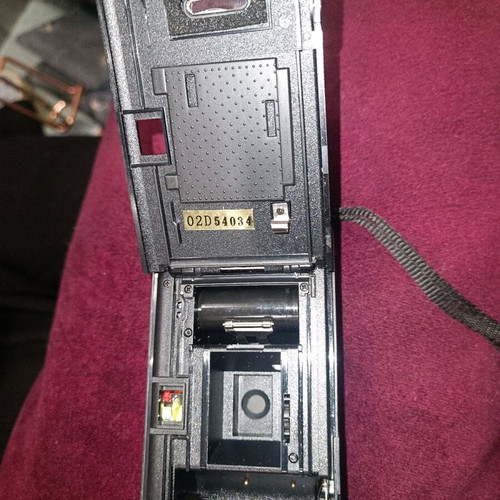 Mini Cam 35mm camera used with built-in flash