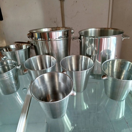 Champagne buckets and ice buckets like new, 2 stainless steel and 6 metal