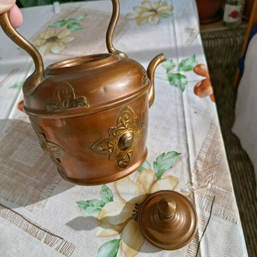 French teapot used with vintage brass decoration