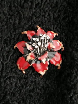 Large flower lapel pin like new, faux metal, red with black and strass