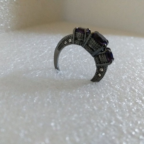 Ring with Purple Crystals and Black Plated Finish like new