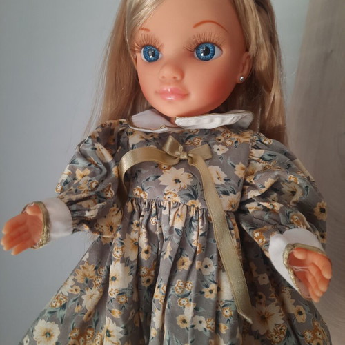 Nancy Famosa doll 2010 with 3 vintage dresses