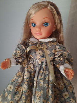 Nancy Famosa doll 2010 with 3 vintage dresses