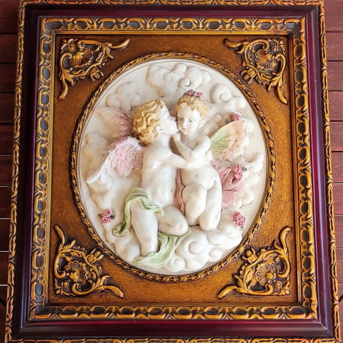 Relief wall art used in ornate frame 56x50cm