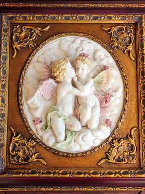 Relief wall art used in ornate frame 56x50cm