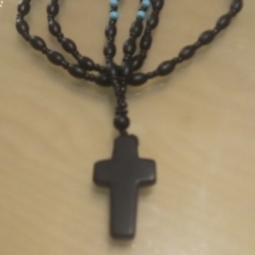 Men's black cross made of natural stone like new