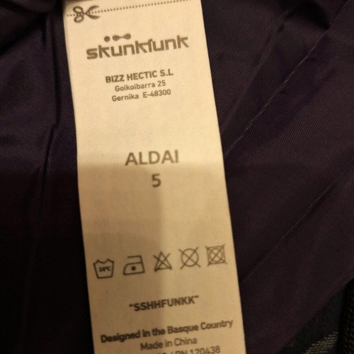 Skunkfunk skirt purple with green piping like new, size Large