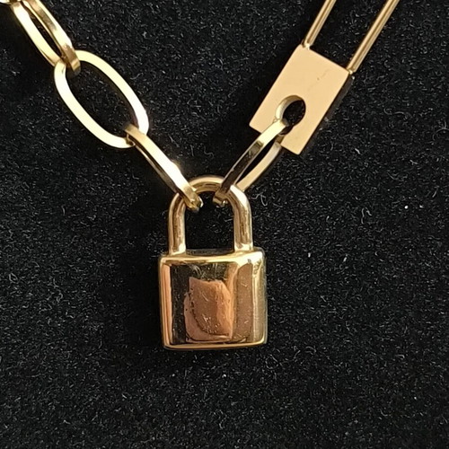 Modern necklace with decorative lock in gold color, new