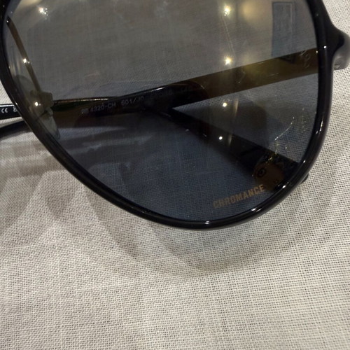 Ray Ban sunglasses black unisex used with minor lens scratches