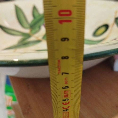 Large ceramic salad bowl used with chip