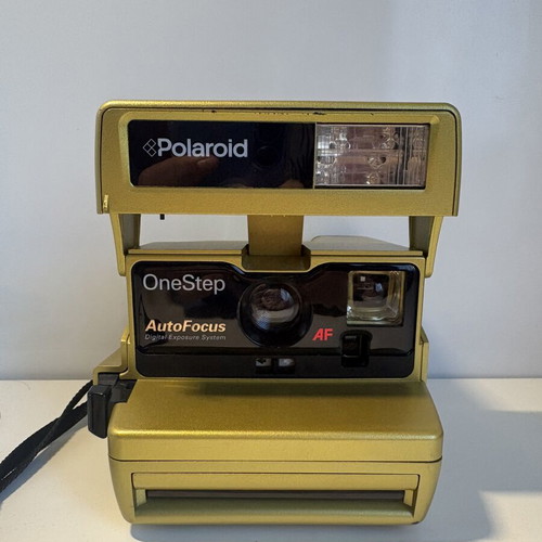 Polaroid OneStep AF camera, gold, for parts or repair